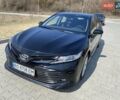 Черный Тойота Камри, объемом двигателя 2.49 л и пробегом 75 тыс. км за 25400 $, фото 1 на Automoto.ua