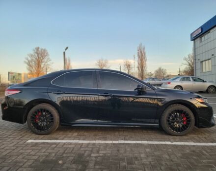 Черный Тойота Камри, объемом двигателя 2.5 л и пробегом 80 тыс. км за 23500 $, фото 1 на Automoto.ua