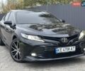 Черный Тойота Камри, объемом двигателя 2.5 л и пробегом 112 тыс. км за 22900 $, фото 1 на Automoto.ua