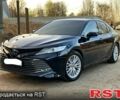 Черный Тойота Камри, объемом двигателя 2.5 л и пробегом 69 тыс. км за 30900 $, фото 1 на Automoto.ua