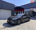 Чорний Тойота Камрі, об'ємом двигуна 2.49 л та пробігом 130 тис. км за 26900 $, фото 2 на Automoto.ua