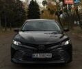 Черный Тойота Камри, объемом двигателя 2.49 л и пробегом 64 тыс. км за 24000 $, фото 1 на Automoto.ua