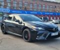Черный Тойота Камри, объемом двигателя 2.5 л и пробегом 80 тыс. км за 23500 $, фото 1 на Automoto.ua