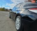 Чорний Тойота Камрі, об'ємом двигуна 2.49 л та пробігом 80 тис. км за 20999 $, фото 1 на Automoto.ua