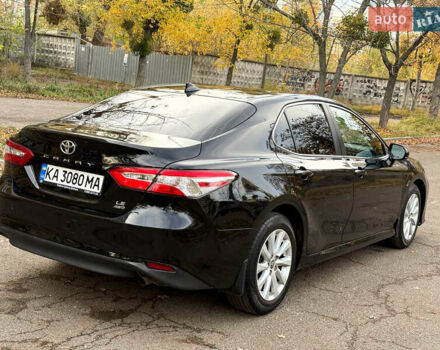 Черный Тойота Камри, объемом двигателя 2.49 л и пробегом 64 тыс. км за 24000 $, фото 2 на Automoto.ua