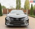 Черный Тойота Камри, объемом двигателя 2.49 л и пробегом 84 тыс. км за 29900 $, фото 1 на Automoto.ua