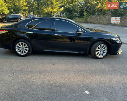 Чорний Тойота Камрі, об'ємом двигуна 2.49 л та пробігом 145 тис. км за 23900 $, фото 1 на Automoto.ua