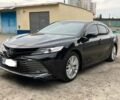 Черный Тойота Камри, объемом двигателя 2.5 л и пробегом 199 тыс. км за 23500 $, фото 1 на Automoto.ua