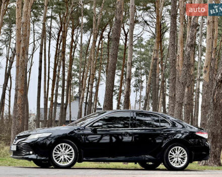 Черный Тойота Камри, объемом двигателя 2.5 л и пробегом 270 тыс. км за 23500 $, фото 1 на Automoto.ua