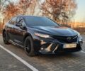 Черный Тойота Камри, объемом двигателя 2.5 л и пробегом 80 тыс. км за 23500 $, фото 1 на Automoto.ua