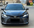 Черный Тойота Камри, объемом двигателя 2.49 л и пробегом 71 тыс. км за 28900 $, фото 1 на Automoto.ua