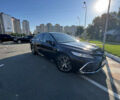 Черный Тойота Камри, объемом двигателя 2.49 л и пробегом 57 тыс. км за 34000 $, фото 1 на Automoto.ua