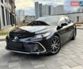 Черный Тойота Камри, объемом двигателя 2.49 л и пробегом 115 тыс. км за 34500 $, фото 1 на Automoto.ua