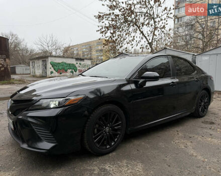 Черный Тойота Камри, объемом двигателя 2.49 л и пробегом 83 тыс. км за 18500 $, фото 1 на Automoto.ua