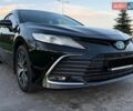 Черный Тойота Камри, объемом двигателя 2.49 л и пробегом 94 тыс. км за 34500 $, фото 1 на Automoto.ua