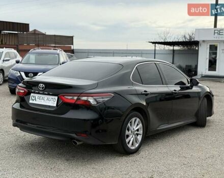 Черный Тойота Камри, объемом двигателя 2.49 л и пробегом 99 тыс. км за 27500 $, фото 1 на Automoto.ua