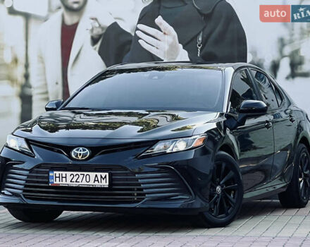Черный Тойота Камри, объемом двигателя 2.49 л и пробегом 57 тыс. км за 22700 $, фото 1 на Automoto.ua