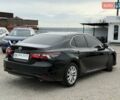 Черный Тойота Камри, объемом двигателя 2.49 л и пробегом 99 тыс. км за 27500 $, фото 1 на Automoto.ua