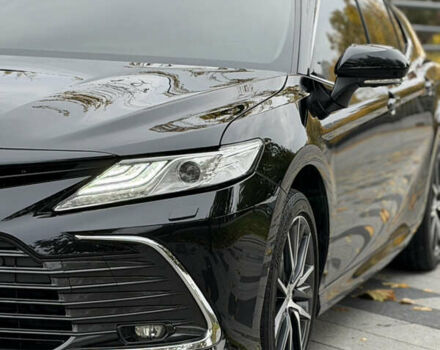 Черный Тойота Камри, объемом двигателя 2.49 л и пробегом 70 тыс. км за 38000 $, фото 1 на Automoto.ua