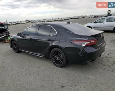 Черный Тойота Камри, объемом двигателя 2.49 л и пробегом 60 тыс. км за 9400 $, фото 1 на Automoto.ua