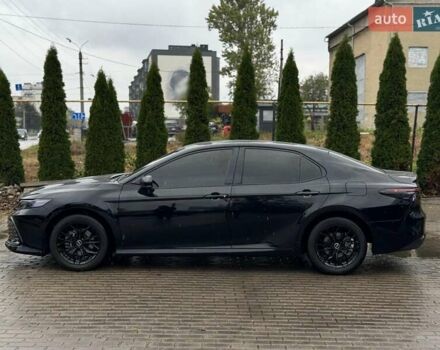 Черный Тойота Камри, объемом двигателя 2.49 л и пробегом 90 тыс. км за 31999 $, фото 1 на Automoto.ua