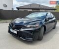 Черный Тойота Камри, объемом двигателя 2.49 л и пробегом 83 тыс. км за 23500 $, фото 1 на Automoto.ua
