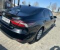 Черный Тойота Камри, объемом двигателя 2.5 л и пробегом 64 тыс. км за 28999 $, фото 1 на Automoto.ua