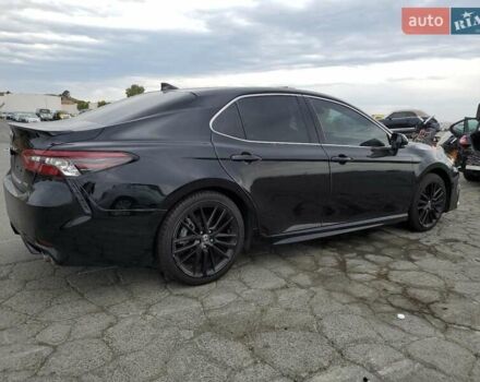 Черный Тойота Камри, объемом двигателя 2.49 л и пробегом 60 тыс. км за 9400 $, фото 2 на Automoto.ua