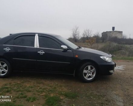 Черный Тойота Камри, объемом двигателя 2.4 л и пробегом 290 тыс. км за 7000 $, фото 2 на Automoto.ua