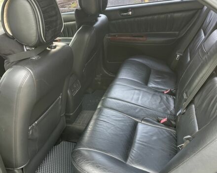 Черный Тойота Камри, объемом двигателя 2.4 л и пробегом 250 тыс. км за 6500 $, фото 22 на Automoto.ua