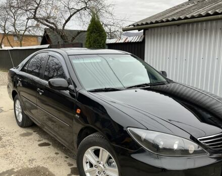 Черный Тойота Камри, объемом двигателя 2.4 л и пробегом 250 тыс. км за 6500 $, фото 17 на Automoto.ua