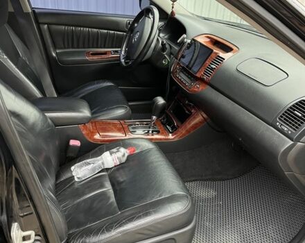 Черный Тойота Камри, объемом двигателя 2.4 л и пробегом 250 тыс. км за 6500 $, фото 12 на Automoto.ua