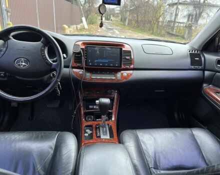 Черный Тойота Камри, объемом двигателя 2.4 л и пробегом 250 тыс. км за 6500 $, фото 21 на Automoto.ua