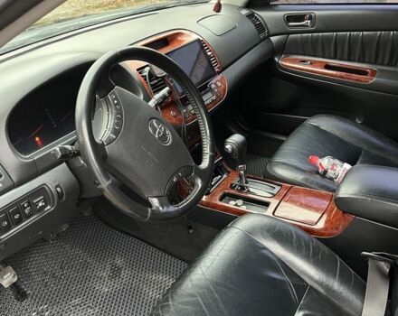 Черный Тойота Камри, объемом двигателя 2.4 л и пробегом 250 тыс. км за 6500 $, фото 4 на Automoto.ua