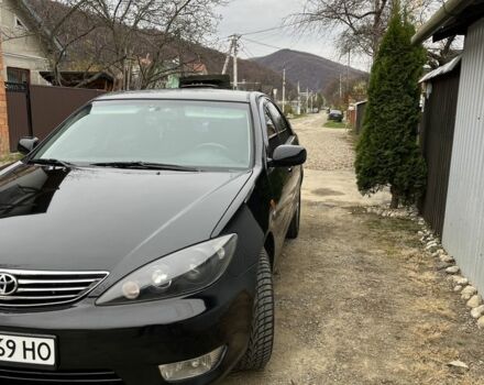 Черный Тойота Камри, объемом двигателя 2.4 л и пробегом 250 тыс. км за 6500 $, фото 16 на Automoto.ua