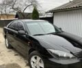 Черный Тойота Камри, объемом двигателя 2.4 л и пробегом 250 тыс. км за 6500 $, фото 7 на Automoto.ua