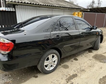 Черный Тойота Камри, объемом двигателя 2.4 л и пробегом 250 тыс. км за 6500 $, фото 19 на Automoto.ua