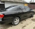 Черный Тойота Камри, объемом двигателя 2.4 л и пробегом 250 тыс. км за 6500 $, фото 19 на Automoto.ua