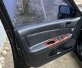 Черный Тойота Камри, объемом двигателя 2.4 л и пробегом 250 тыс. км за 6500 $, фото 2 на Automoto.ua