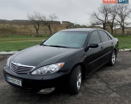 Черный Тойота Камри, объемом двигателя 3 л и пробегом 325 тыс. км за 6000 $, фото 1 на Automoto.ua