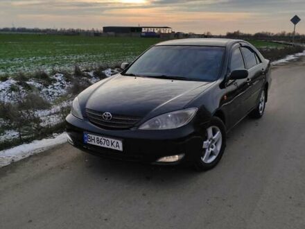 Черный Тойота Камри, объемом двигателя 3 л и пробегом 399 тыс. км за 4850 $, фото 1 на Automoto.ua