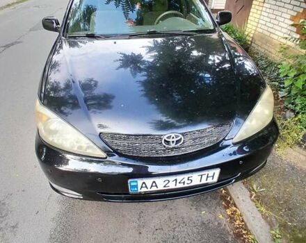 Черный Тойота Камри, объемом двигателя 3 л и пробегом 400 тыс. км за 4000 $, фото 1 на Automoto.ua