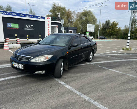 Черный Тойота Камри, объемом двигателя 2.37 л и пробегом 270 тыс. км за 5900 $, фото 1 на Automoto.ua