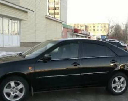 Черный Тойота Камри, объемом двигателя 2.4 л и пробегом 294 тыс. км за 7000 $, фото 1 на Automoto.ua