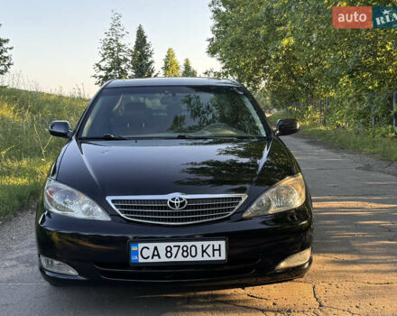 Черный Тойота Камри, объемом двигателя 2.36 л и пробегом 356 тыс. км за 5800 $, фото 1 на Automoto.ua
