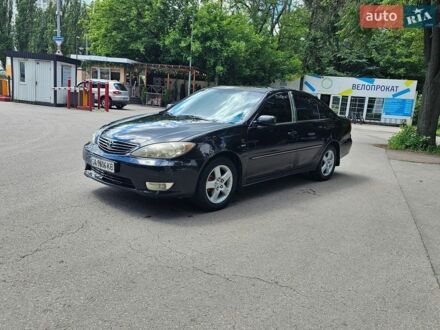 Черный Тойота Камри, объемом двигателя 2.36 л и пробегом 377 тыс. км за 3100 $, фото 1 на Automoto.ua