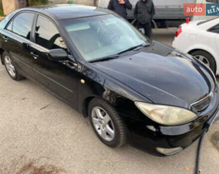 Черный Тойота Камри, объемом двигателя 2.36 л и пробегом 361 тыс. км за 3999 $, фото 1 на Automoto.ua