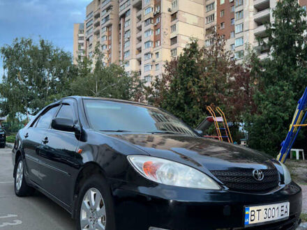 Черный Тойота Камри, объемом двигателя 3 л и пробегом 328 тыс. км за 6600 $, фото 1 на Automoto.ua