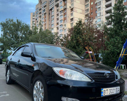 Черный Тойота Камри, объемом двигателя 3 л и пробегом 328 тыс. км за 6600 $, фото 1 на Automoto.ua