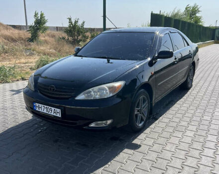 Черный Тойота Камри, объемом двигателя 2.36 л и пробегом 360 тыс. км за 5150 $, фото 1 на Automoto.ua